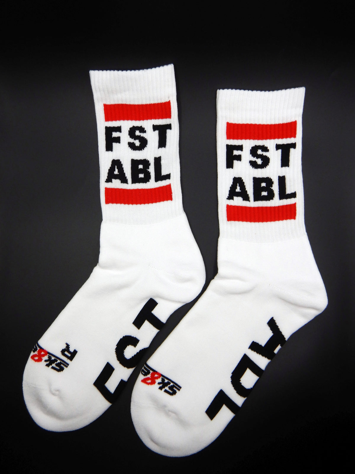Close-up of our sk8erboy fst abl socks for all guys who like fisting and love these fluffy socks with a large red stripe, logo, and lettering.