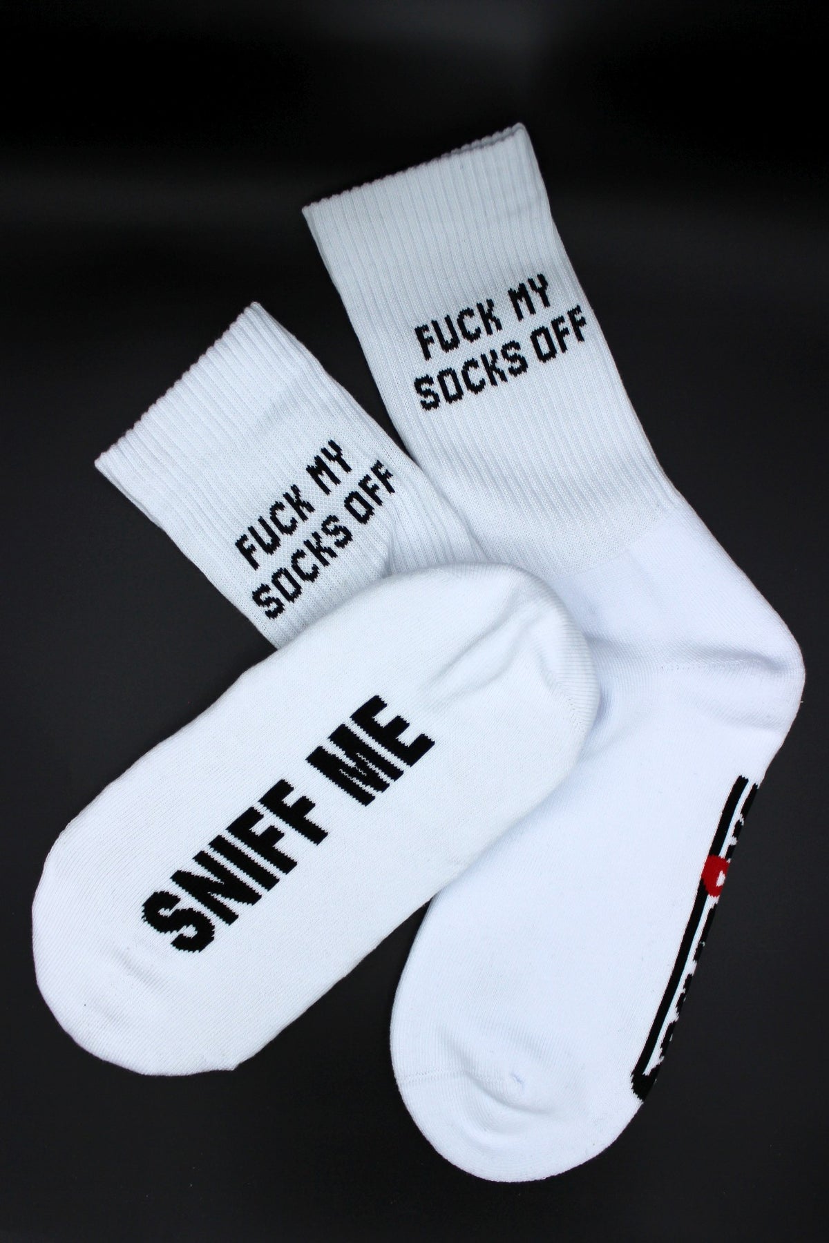 white Sk8erboy socks with Sniff Me on the underside and large logo in close-up